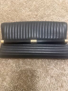 Diane Von Furstenberg Black Quilted Leather Clutch with Gold Accent Bar